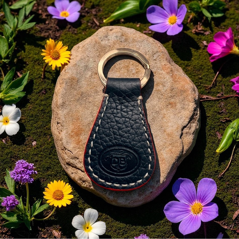 DOONEY & BOURKE LOGO KEY FOB/ KEY CHAIN. Navy Blue Leather Red Trim